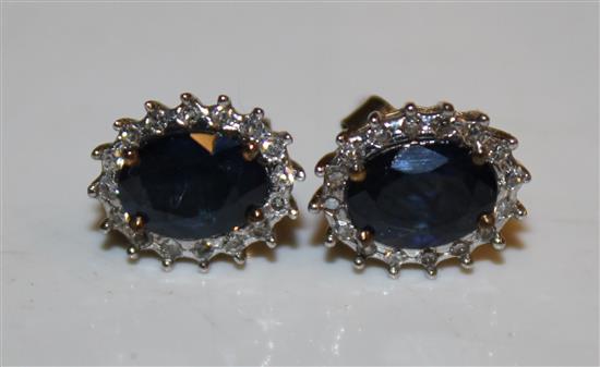 Pair of sapphire and diamond cluster earrings
